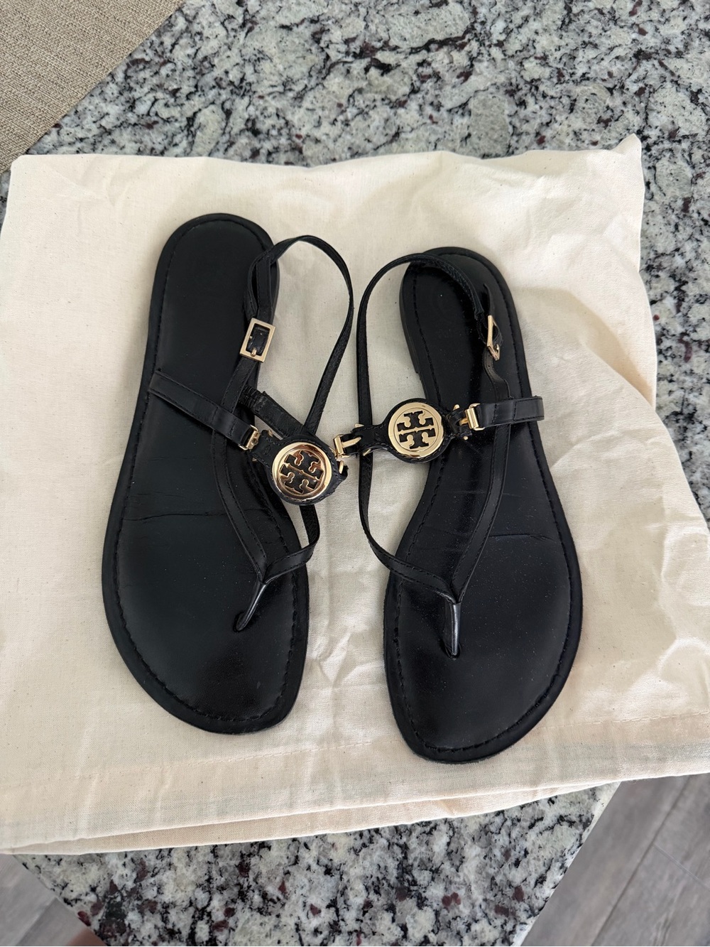 Tory Burch Black Leather Logo Thong Sandals with Gold Medallions